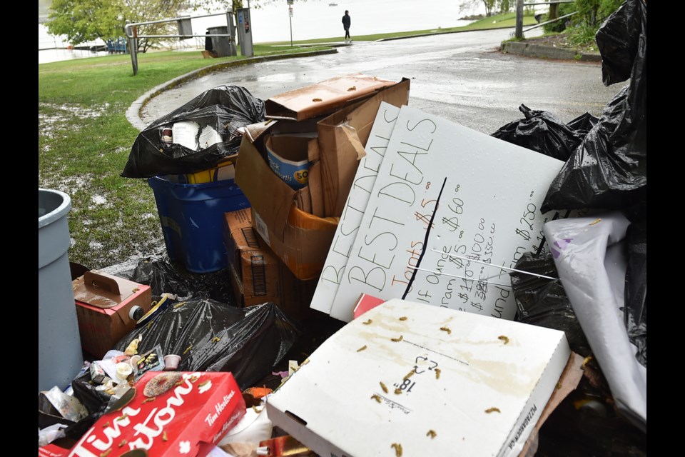 A pile of garbage waited to be picked up near the entrance to Sunset Beach Park parking lot on April 22. Photo Dan Toulgoet