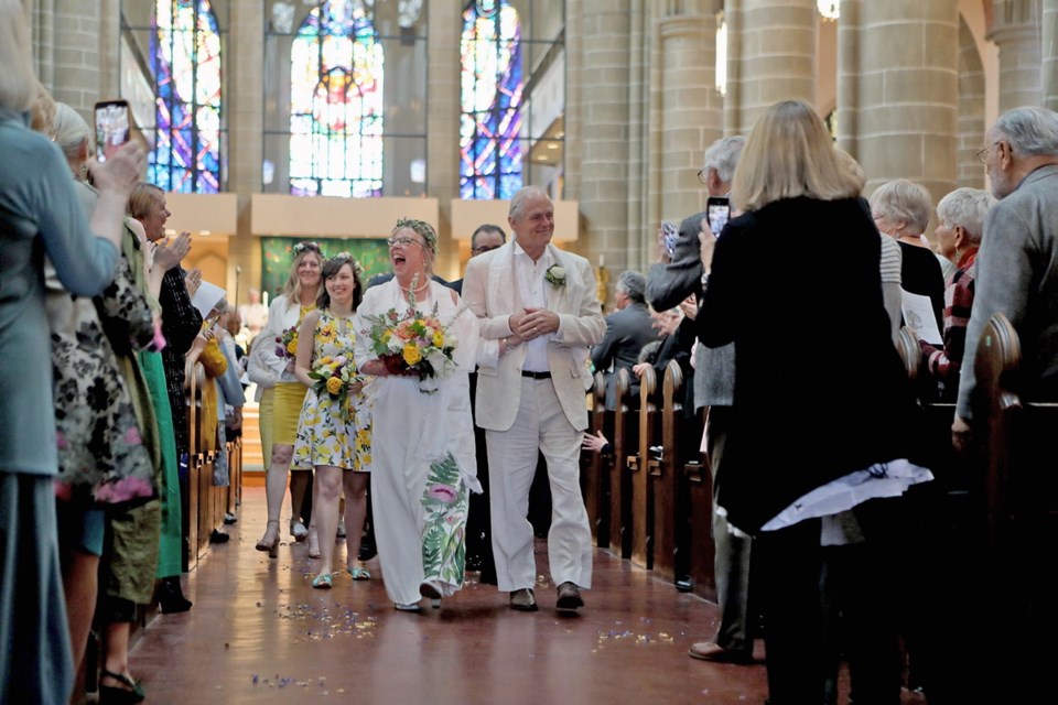 Elizabeth May and John Kidder walk down the aisle at Christ Church Cathedral in Victoria after exchanging wedding vows. April 22, 2019