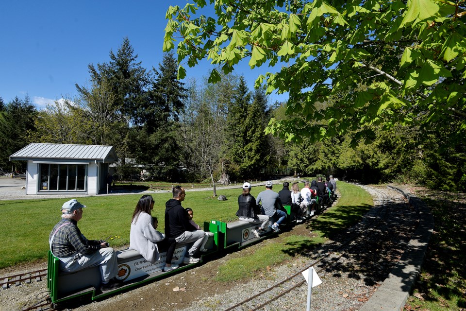 The train makes its way around the tracks at Burnaby Central Railway.