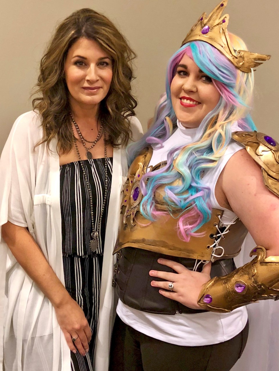 My Little Pony: Friendship is Magic voice actor Nicole Oliver with one of her many adoring fans.