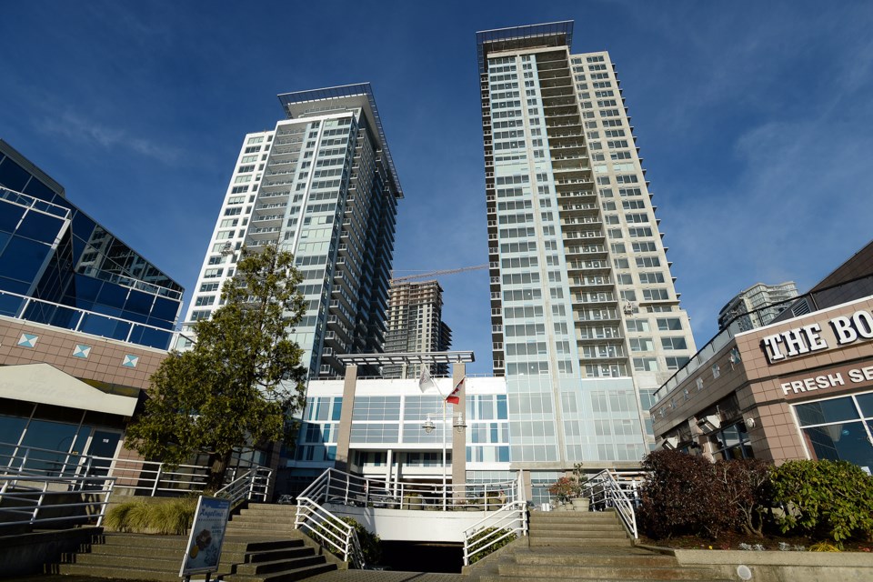 Two new towers, as seen from the waterfront boardwalk, are nearing completion at 1000 Quayside Dr. Some residents have started moving in to the west tower at the RiverSky development.
