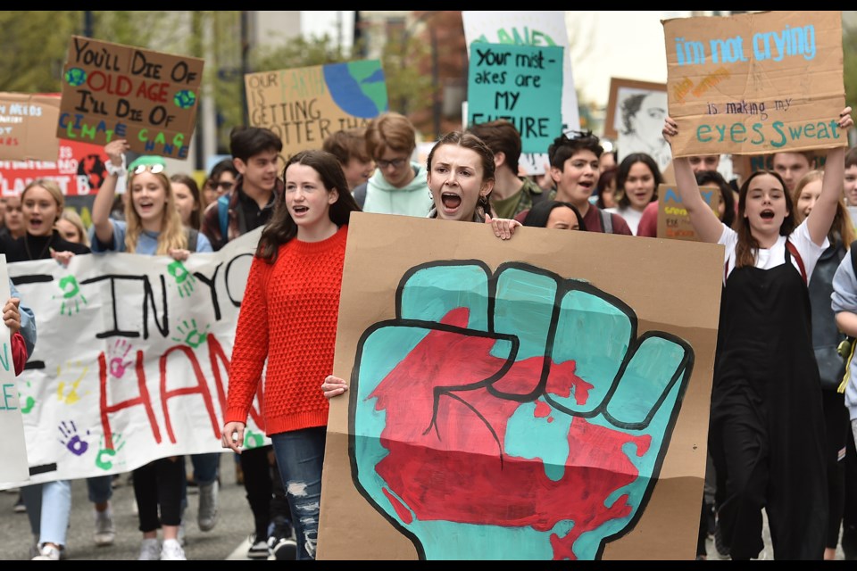 Hundreds of students from across the Lower Mainland took to the streets of downtown Vancouver Friday, marching for action on climate change as part of the Climate Strike movement. Photo Dan Toulgoet