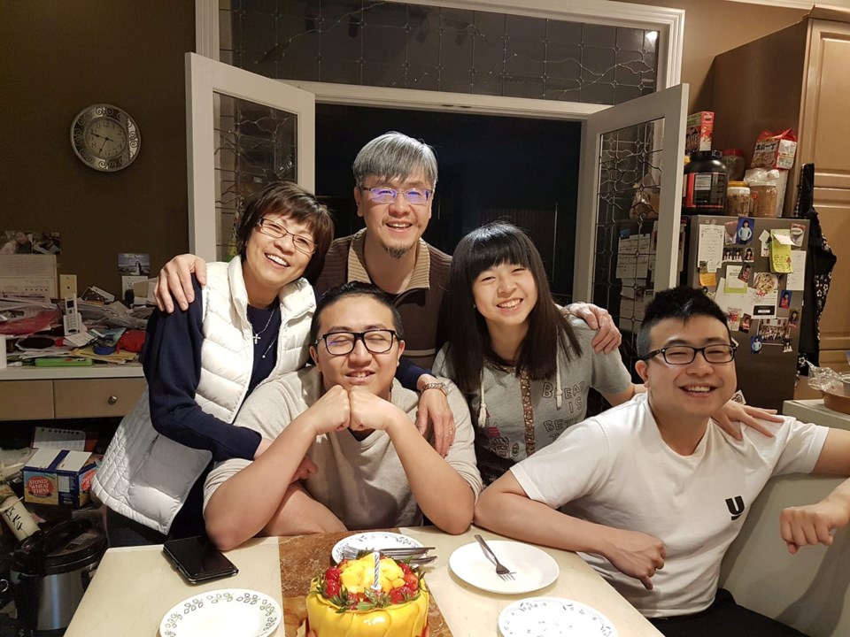 Cheung with his family