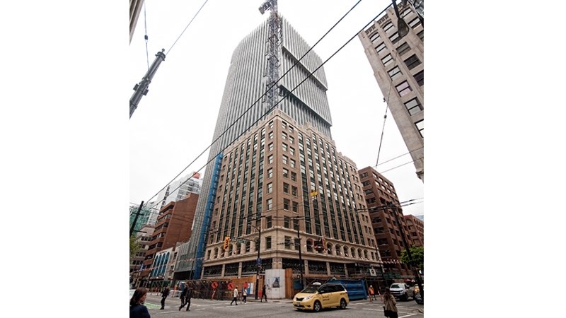 The refurbished old exchange building forms the base of the tower. Photo Chung Chow