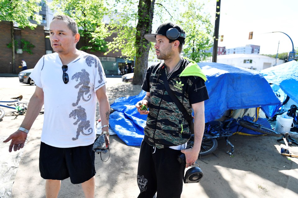 Sandy Parisien (left) and Jacob Giles are one of many people currently camping at Oppeheimer Park. P