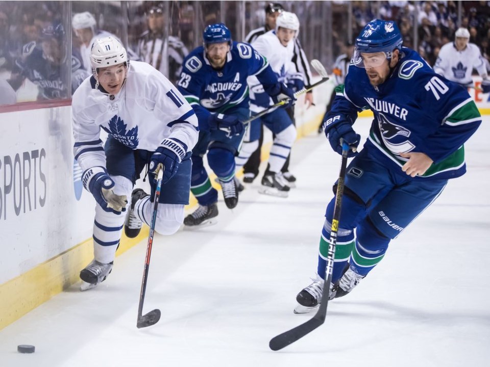 Tanner Pearson chases down his check for the Vancouver Canucks