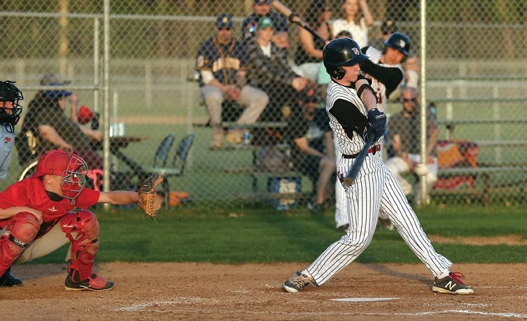 Midget Knights batter Kolby Lukinchuck swings on a pitch against the Red Sox on Friday night at Citizen Field as the two teams met in the PGSBL Bud Light Classic baseball tournament.