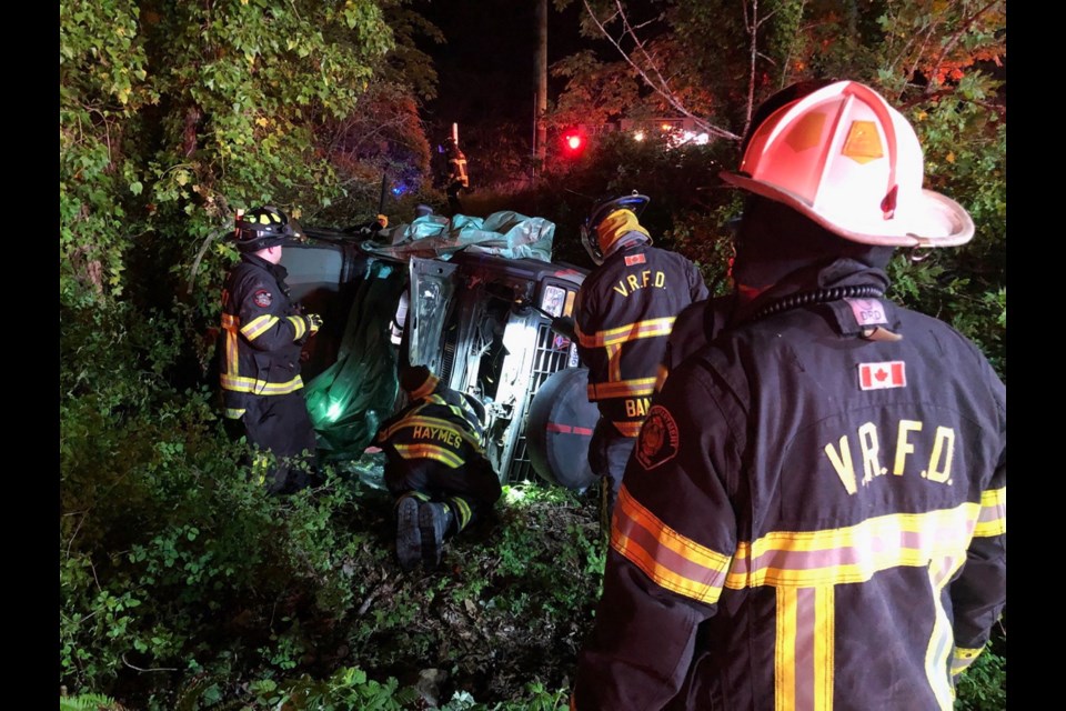 A vehicle flipped into the brush in the 300-block of Island Highway early this morning.