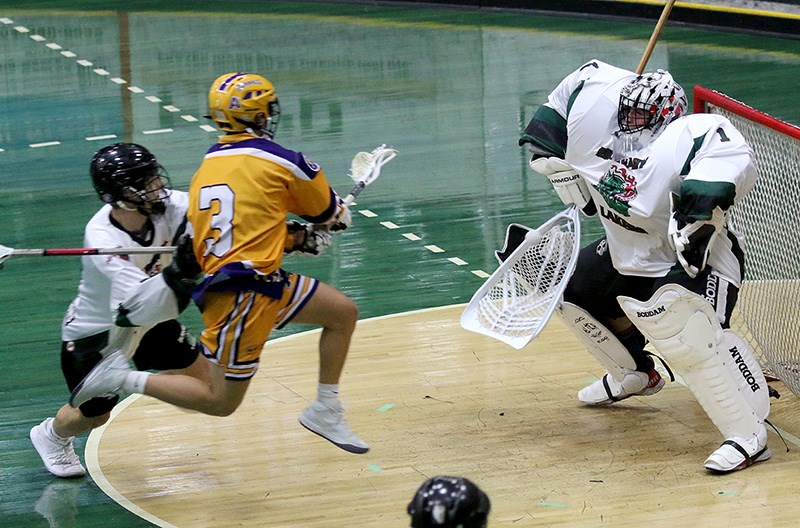 Burnaby Lakers goalie Matteo Teck stops Coquitlam Adanacs forward Spencer Ma on a first period breakaway in their BC Junior A Lacrosse League game Monday at Copeland Arena in Burnaby. The Adanacs won, 7-2.