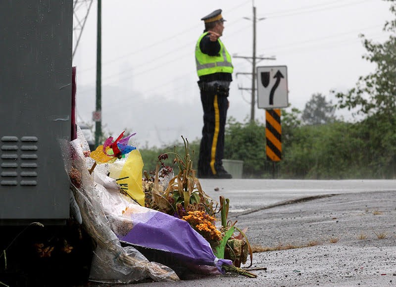 Coquitlam RCMP set up at the corner of Mariner Way and Riverview Crescent Tuesday for a re-enactment of the collision March 25 that killed a 13-year-old girl as she and a group of friends waited in the island for a traffic light to change.
