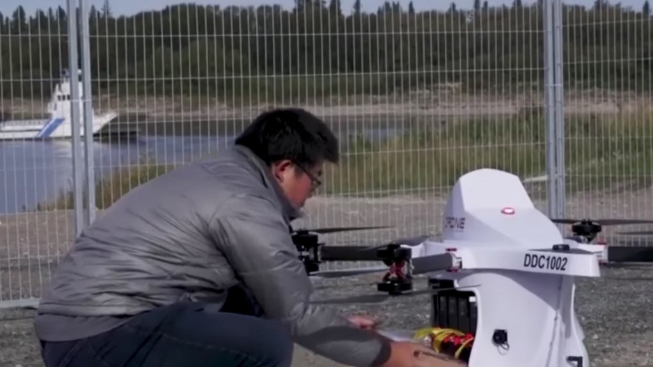 A Drone Delivery Canada drone is loaded before it flies to the community of Moose Factory, Ontario.