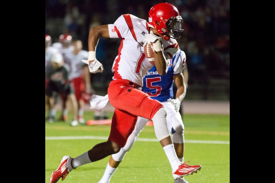 UBC's Malcolm Lee, shown above while breaking for big yards as a member of the St. Thomas More Knights, was chosen in the fifth round by the Calgary Stampeders. His stock took a hit when the defensive back failed a test for a banned substance earlier this year. He's since undergone a second test, hoping a clear reading will permit him to sign this season with the CFL club.