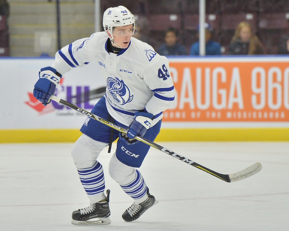 Thomas Harley of the Mississauga Steelheads skates up ice.