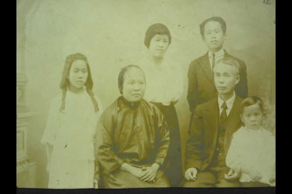 Chung family, circa 1916 A family portrait, perhaps taken at the time of Victoria Chung's high school graduation.
