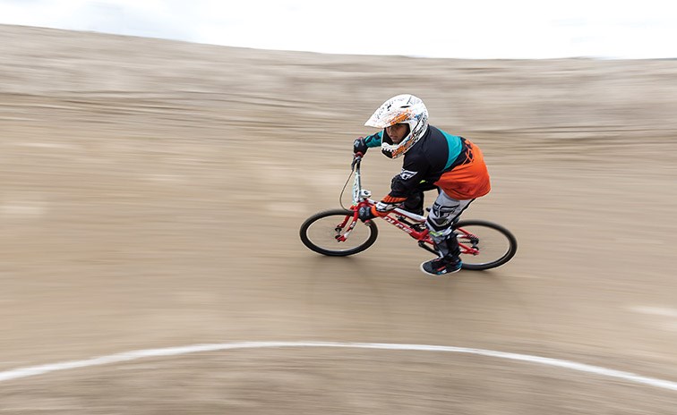 Dawson Miller races around the track at Rolling Mix Supertrak BMX Park on Sunday morning during the Supertrak BMX Ride for Life. Citizen Photo by James Doyle
