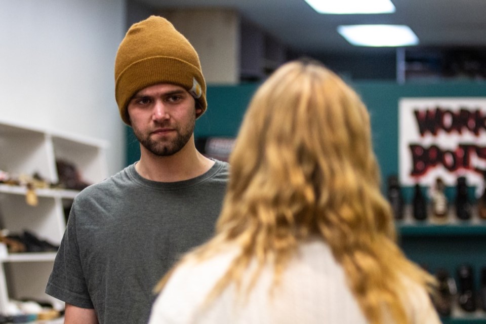 With performance space at a premium in the city, actors Nich Gulycz and Kennedy Crane, seen here rehearsing for 'Brothers' with director Paul Rancourt, have taken to after-hours space at downtown shop The Big Boot Inn.