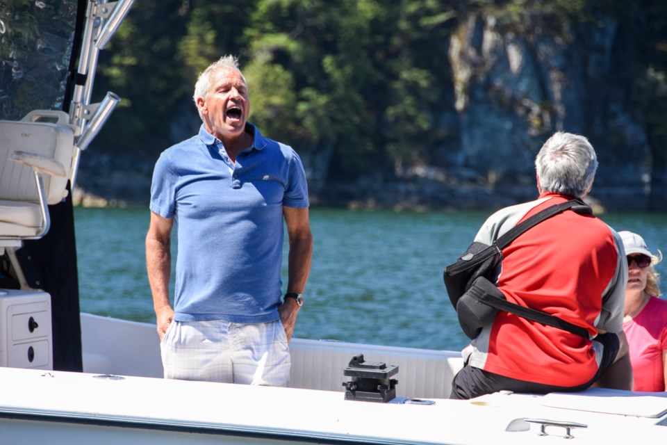 A boater's reaction after MacVicar warns him that he got too close to the transient orca family