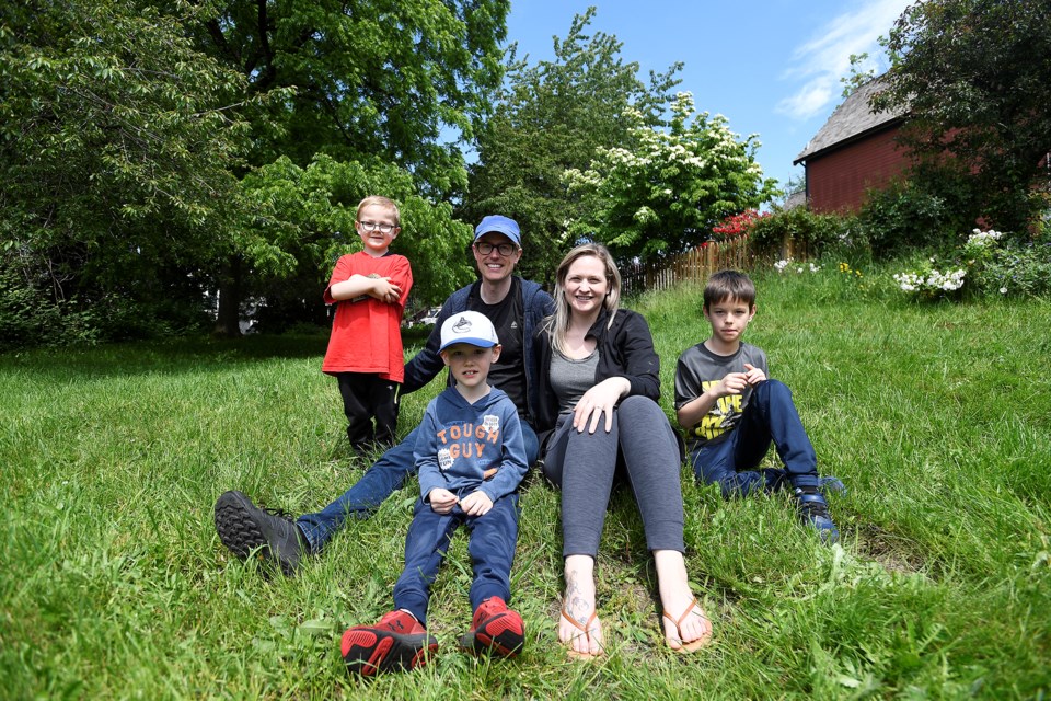 Brow of the Hill residents, including Melanie Dubowits and Devin Phillips with their children Mason, Travis and Julian, are urging the city to buy a vacant lot on Cornwall Street and turn it into into a pocket park.