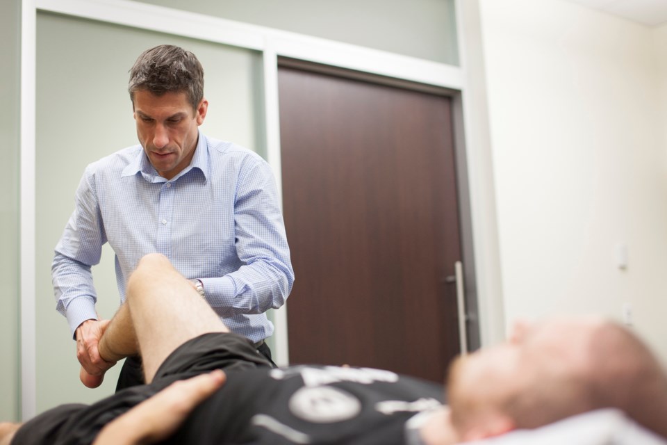 Burnaby's Rick Celebrini, shown during his days as member of the Vancouver Canucks medical staff, is looking to help the Golden State Warriors capture the NBA championships. The Fortius Sport and Health cofounder is one of two Burnaby doctors in the final series -- as the Toronto Raptors have renowned Fortius co-founder Alex McKechnie on its staff.