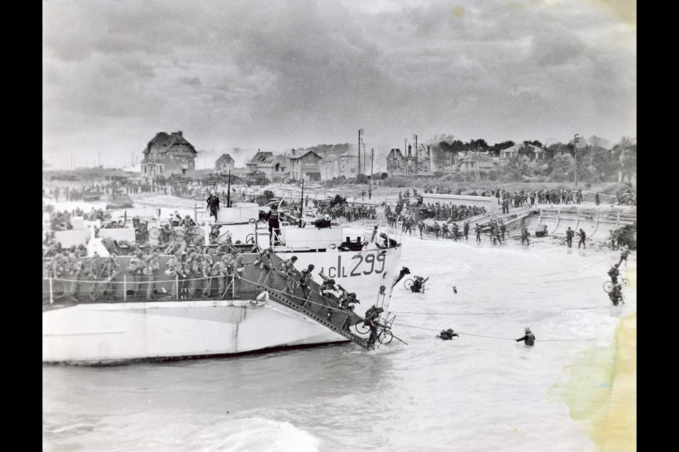 Canadian soldiers land on the Normandy, France, beach during the D-Day invasion on June 6, 1944.