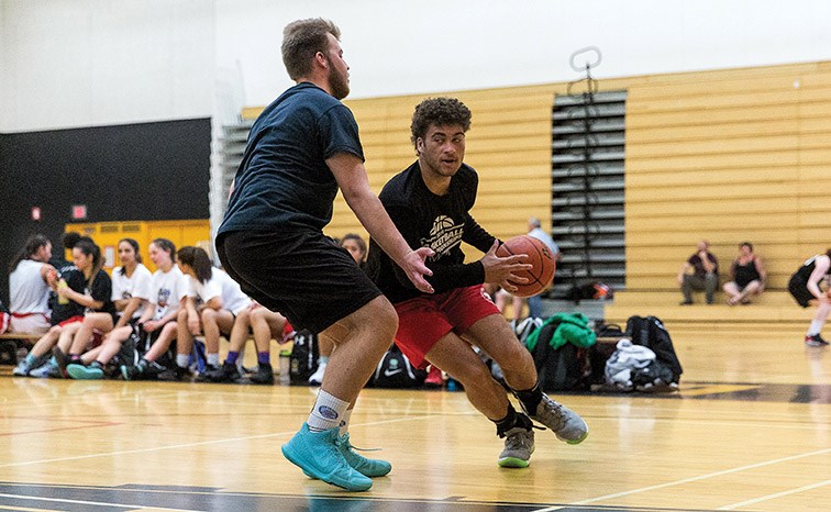 Holden Black drives to the net on Saturday while competing in the 5th Annual PG Summer Hoops Classic 3 vs 3 basketball tournament at Duchess Park gymnasium. Citizen Photo by James Doyle