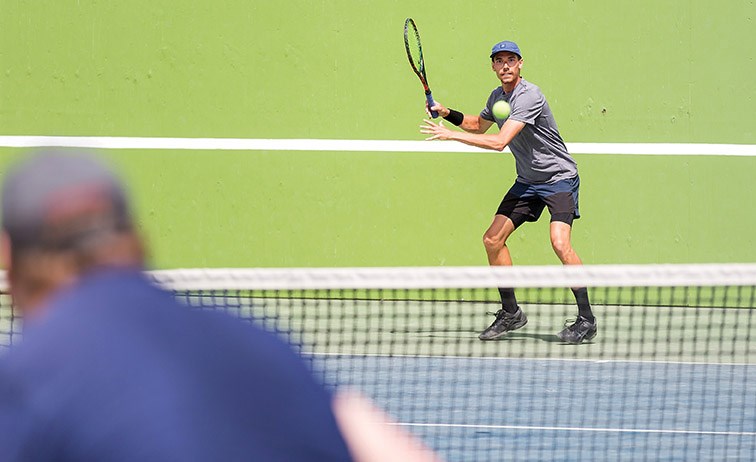 Cory Fleck eyes up a forehand return against Jim Condon on Sunday afternoon at the Prince George Tennis and Pickleball Club during the Men’s Advanced Singles championship game of the Spring Fling Open tennis tournament. Citizen Photo by James Doyle
