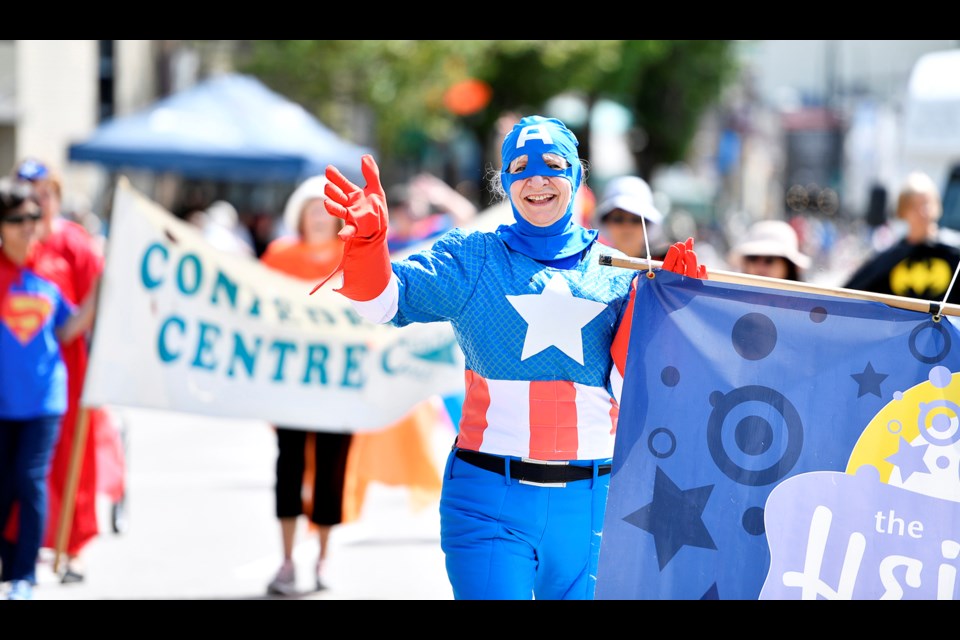 Parade participants embraced the superhero theme in style.