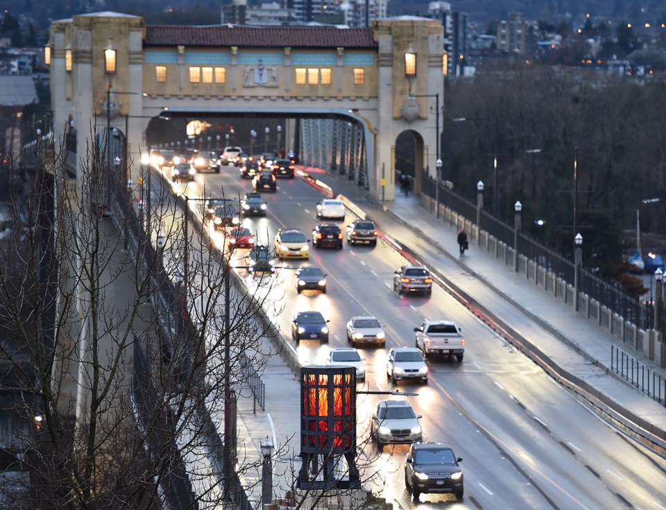 Looking south at the Burrard Bridge memorial braziers. Photo Dan Toulgoet