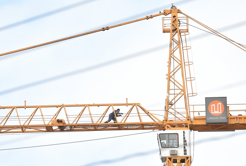 A man on his crane in Mount Pleasant. Photo Dan Toulgoet