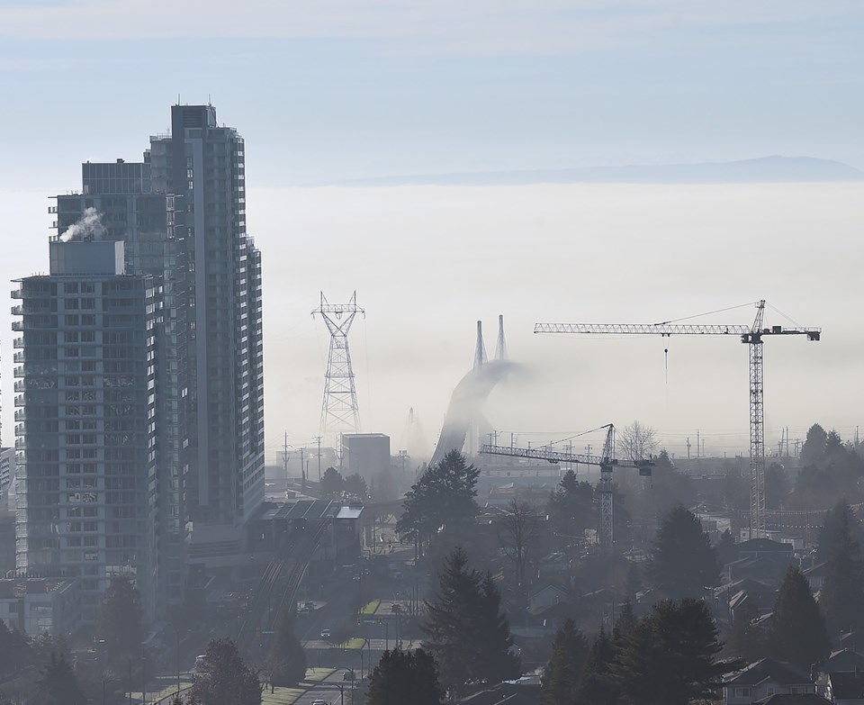 Morning fog off the Fraser River at Marine Drive and Cambie Street. Photo Dan Toulgoet