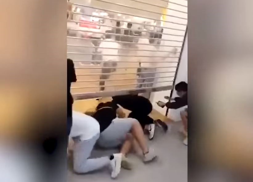 Shoppers in China were desperate to get their hands on a new line of clothing at Japanese retailer Uniqlo. The clothes will be available in Richmond on Friday. YouTube screenshot