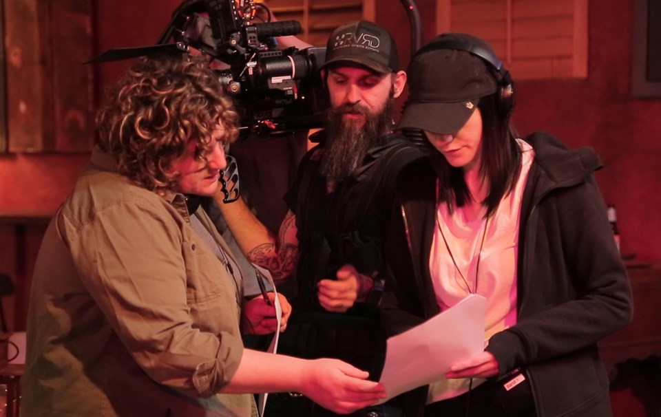 Liz Levine (left) on the set of Turning the Tables.