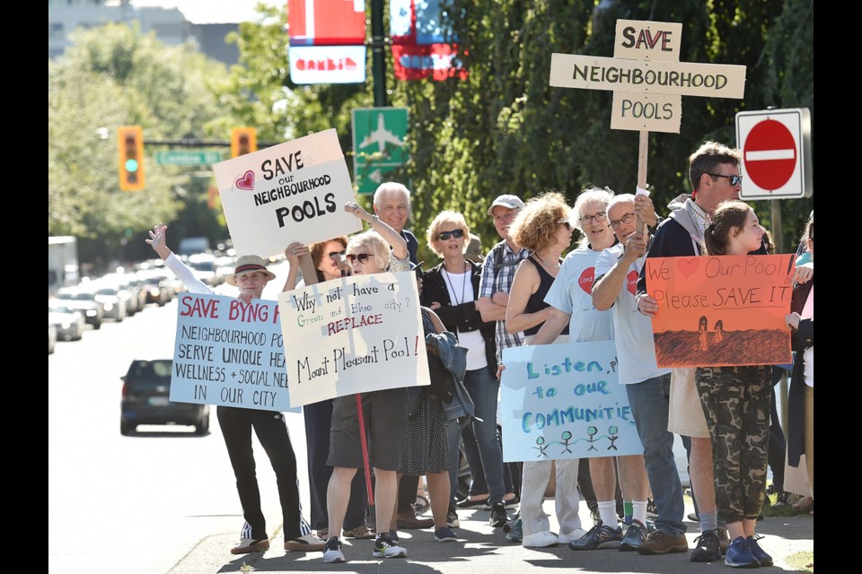 A group of residents rallied outside Vancouver City Hall at 12th and Cambie Monday evening. They wanted to make sure members of the VanSplash advisory committee heard their message — keep the city’s small community pools open. Photo Dan Toulgoet