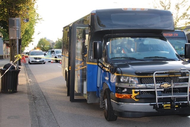 Burnaby RCMP were called to Hastings Street at Carleton Avenue on Tuesday afternoon after a pedestrian was struck by a transit bus. SHANE MACKICHAN PHOTO