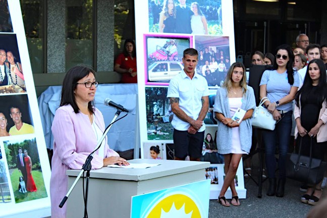 Bridget Malcom, Olivia Malcom's mom, speaks at a ceremony outside Queen's Park Arena on Monday night to honour the legacy of the young woman killed in a tragic accident last June.In addition to unveiling a bench in Olivia's name, the Olivia Malcom Kindness Foundation has donated $5,000 to the Camp Kerry Society and has awarded its inaugural bursaries to students exemplifying what Olivia stood for - her kindness and her ability to encourage others to be their best.