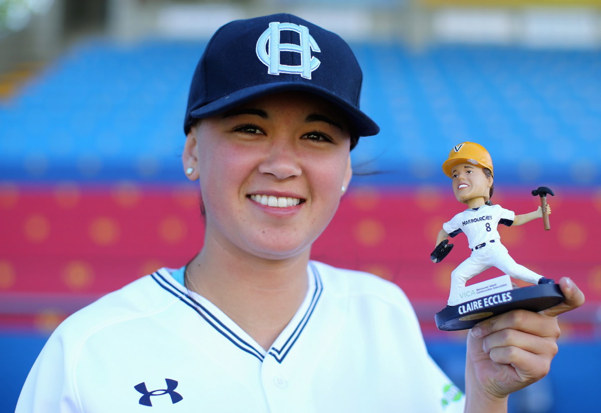 Claire Eccles, 19, pitches while posing for a photograph at the University  of British Columbia in Vancouver, B.C., on Friday May 12, 2017. The  Victoria HarbourCats announced Tuesday that Eccles will join