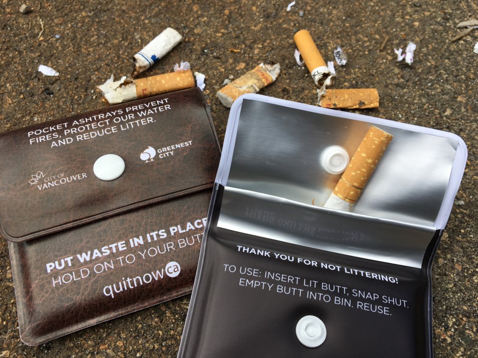 The city recently made available thousands of free pocket ashtrays for smokers to store their butts