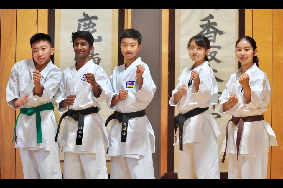 Team BC members with the Steveston Karate Club include Alex Amog, Vikrant Anandkumar, Haruki Mori, Yuki Mori and Amane Takeuchi. Missing is Erika Chow.