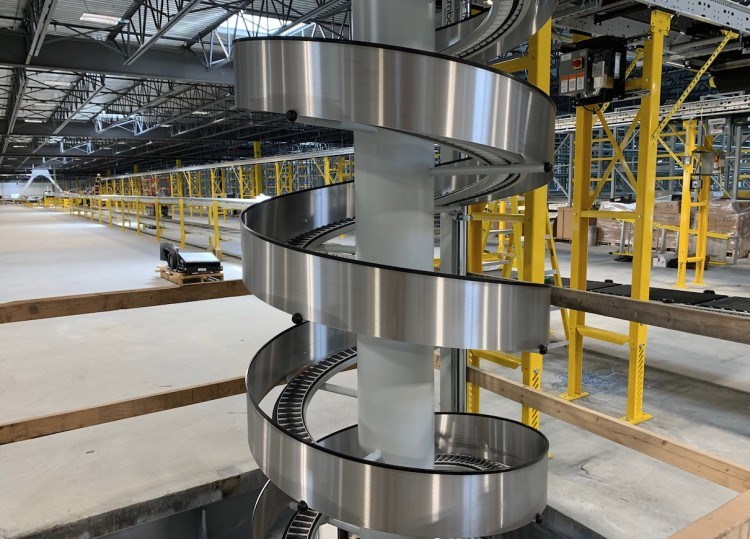 One spiral conveyor at Amazon’s Tsawwassen facility carries goods from an upper floor to a lower one