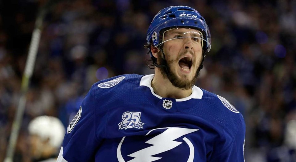 J.T. Miller celebrates a goal with the Tampa Bay Lightning.