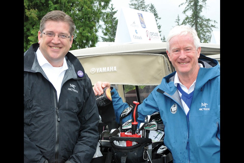 Current District of North Vancouver Mayor Mike Little and former mayor Richard Walton.