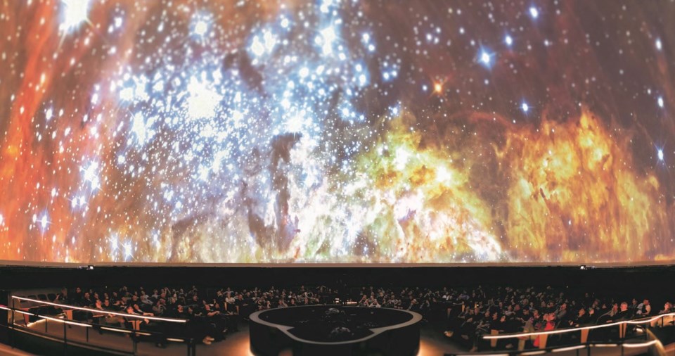 John Tanner and Craig McCaw produced the Planetarium famed laser shows that matched music with stars