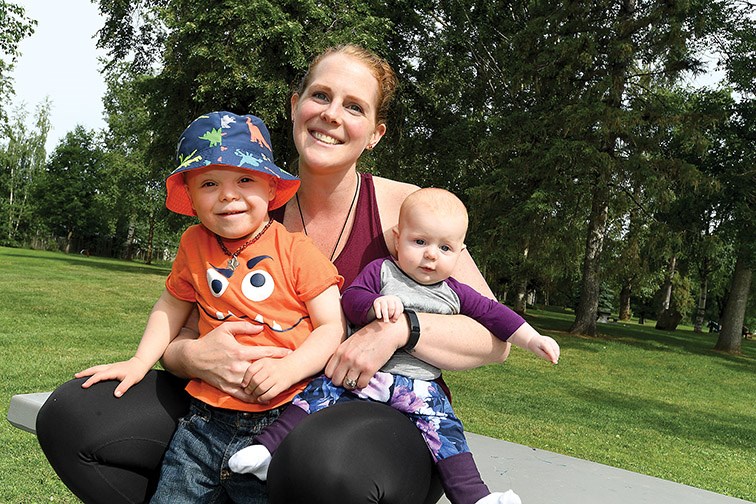 Karver Fuller, 3, with mom Kristy and sister Farryn 4 1/2 months at Lheidli T'enneh Memorial Park.