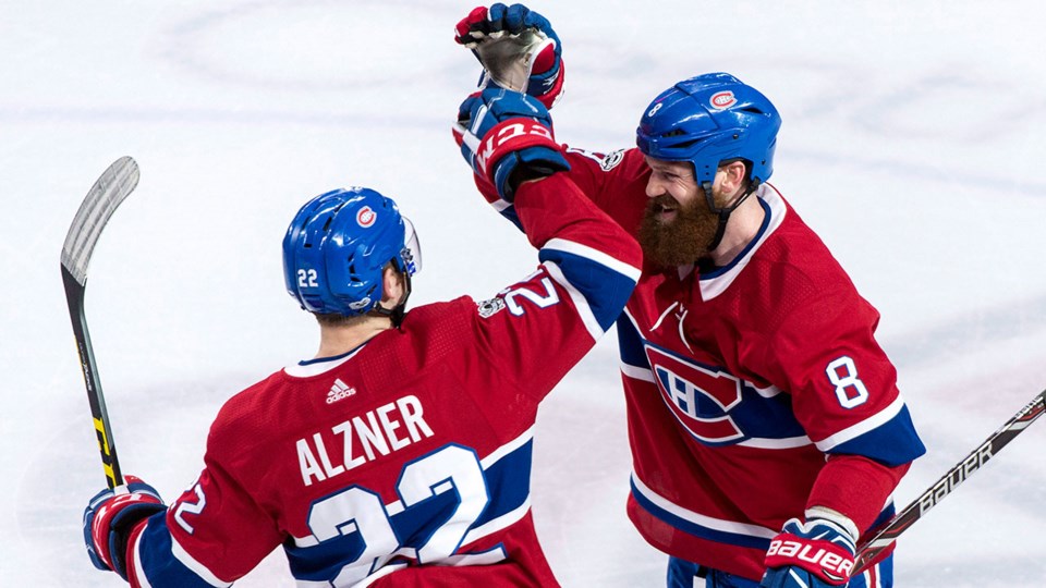 Jordie Benn celebrates a goal with the Montreal Canadiens.