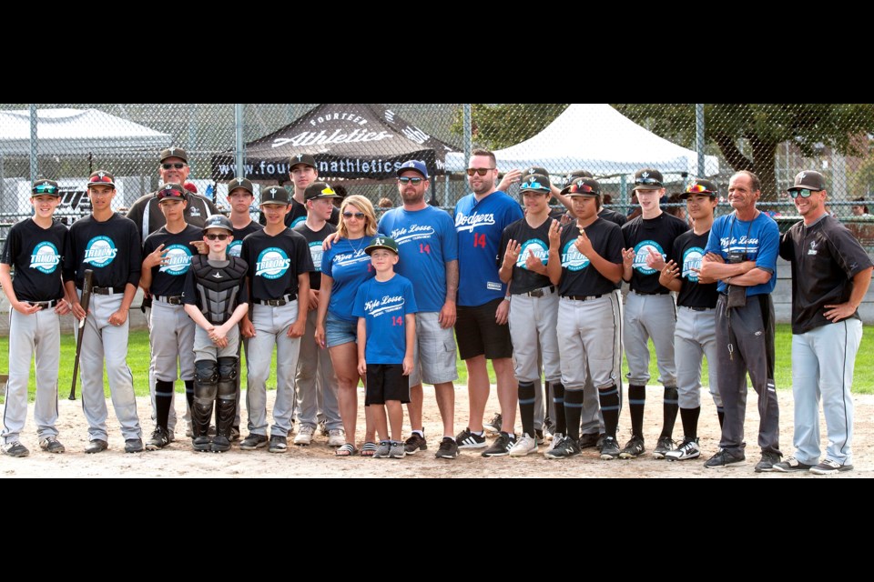The Losse family with White Rock Tritons after they captured the second annual Kyle Losse Bantam AAA Memorial Tournament with a win over host Delta Tigers in Monday's championship game at Winskill Park.