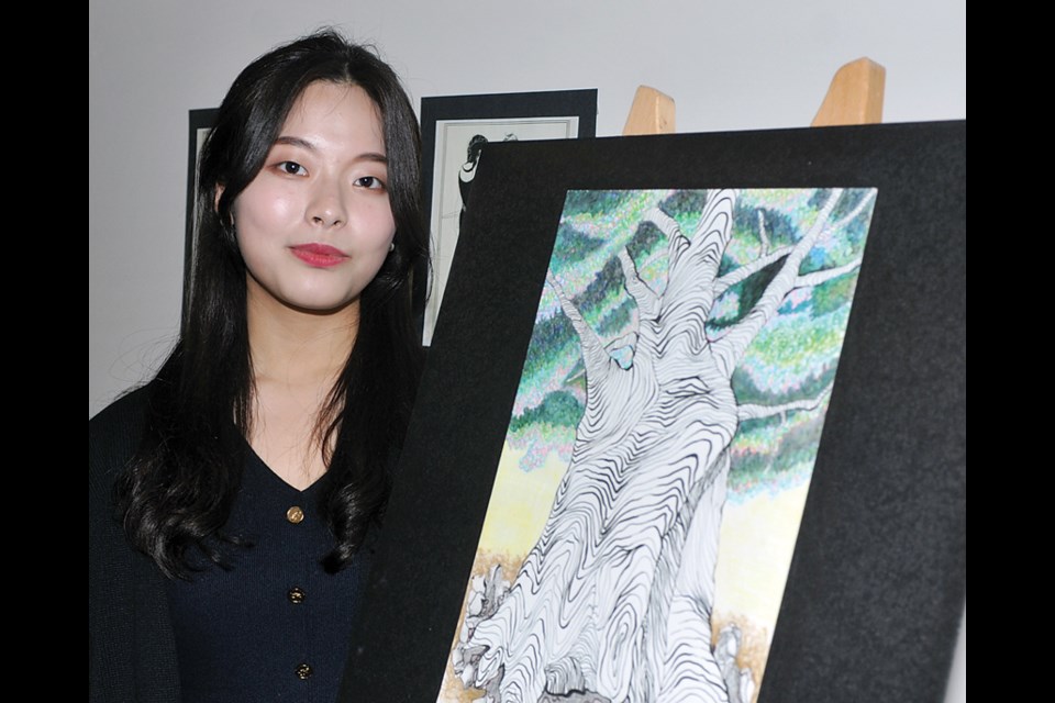 Artist Claire Yoon and her painting Prevailing Strength.