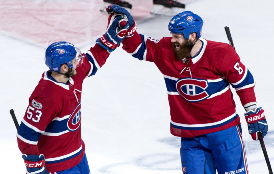 Jordie Benn celebrates a goal for the Montreal Canadiens.