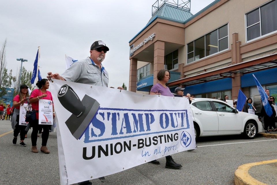 Representatives from several unions rally Friday in support of unionized workers who've been on stri