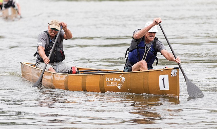 Patrick Turner and Kevin Taylor cross the finish line on the Fraser River on Saturday while participating in the Alexander Mackenzie class of the 2019 Northern Hardware Prince George Canoe Race. Citizen Photo by James Doyle