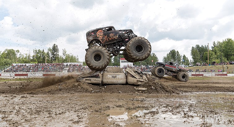 The California Kid goes head-to-head against High Voltage on Sunday afternoon at PGARA Speedway during the Malicious Monster Trucks Insanity Tour. Citizen Photo by James Doyle